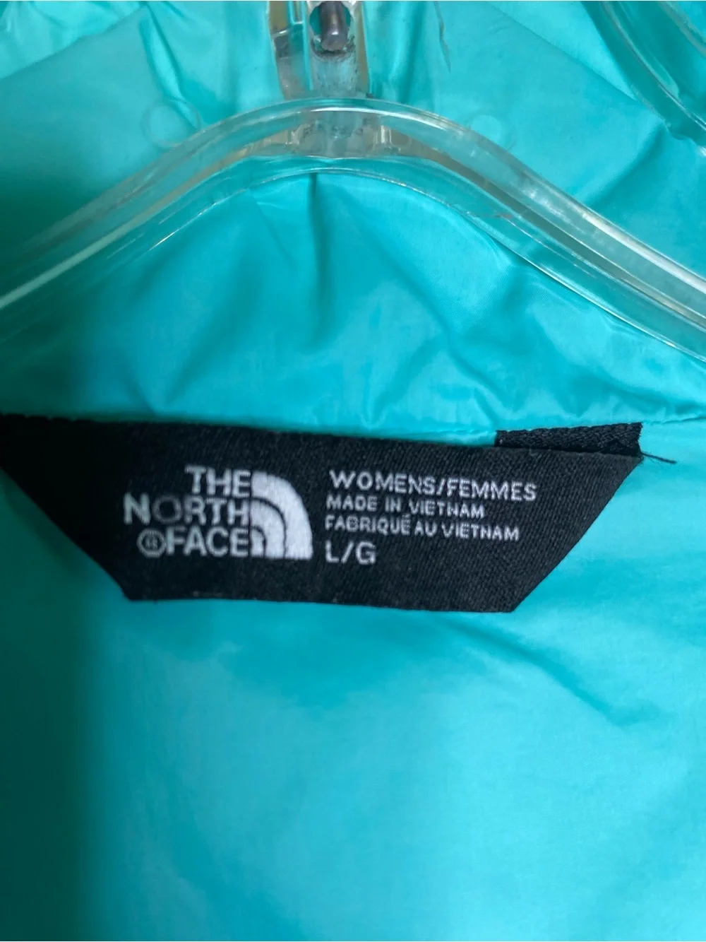 The North Face zip up puffer jacket size large